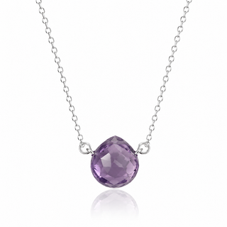 A silver chain necklace featuring a faceted teardrop-shaped purple gemstone pendant, displayed against a clean white background with a soft reflection below.